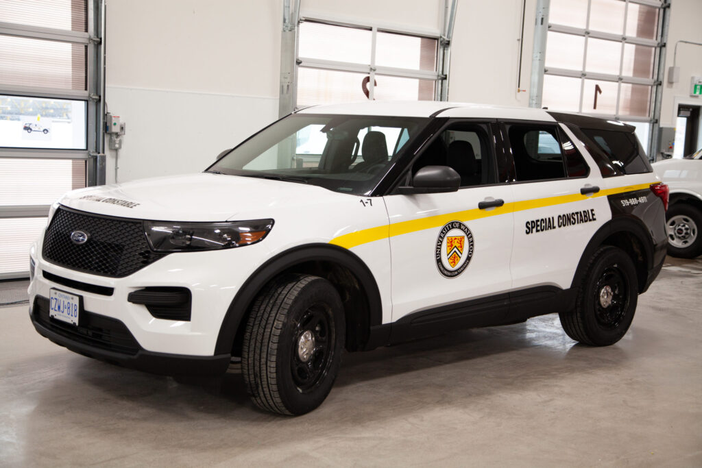 a white car with yellow stripe